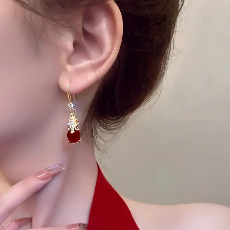 Boucles d'oreilles Eléphants avec pierre en agate rouge, bijou en acier inoxydable doré