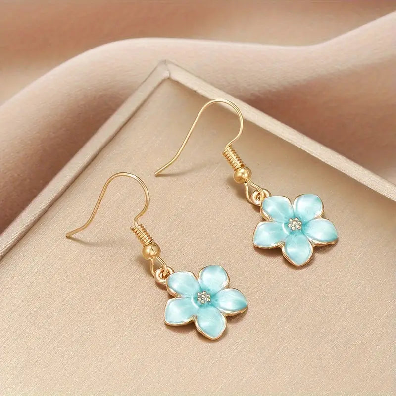 Boucles d'oreilles Fleurs de sakura bleues, bijou en acier inoxydable et en émail