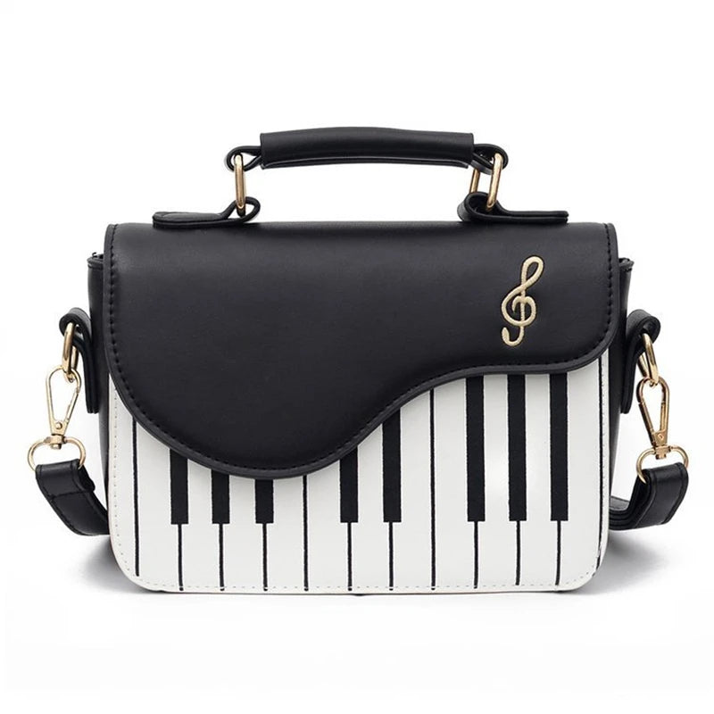 Sac à bandoulière design piano, noir et blanc, en simili-cuir