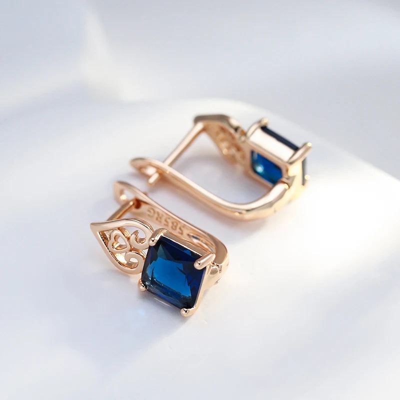 Boucles d'oreilles avec zircons bleu saphir et coeurs arabesques, bijou en plaqué or rose