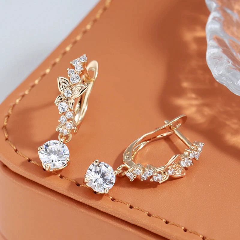 boucles d'oreilles papillons et zircons blancs