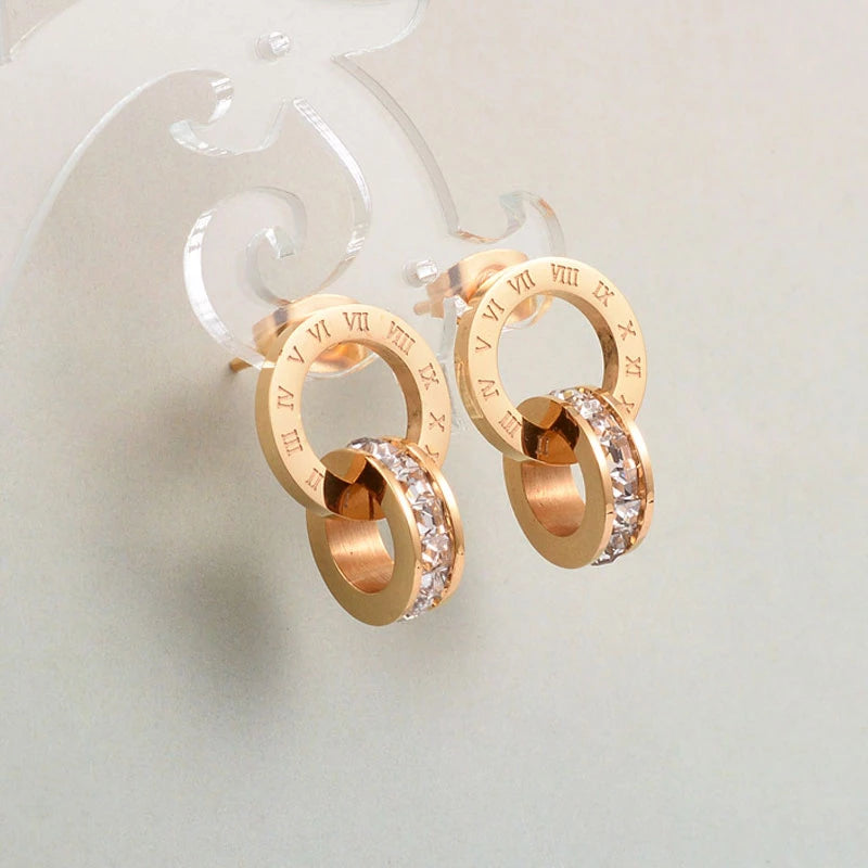 boucles d'oreilles avec chiffres romains et zircons