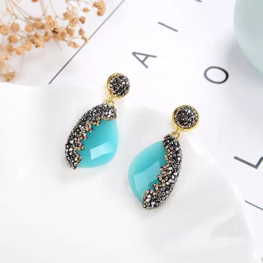 boucles d'oreilles en cristal bleu avec strass