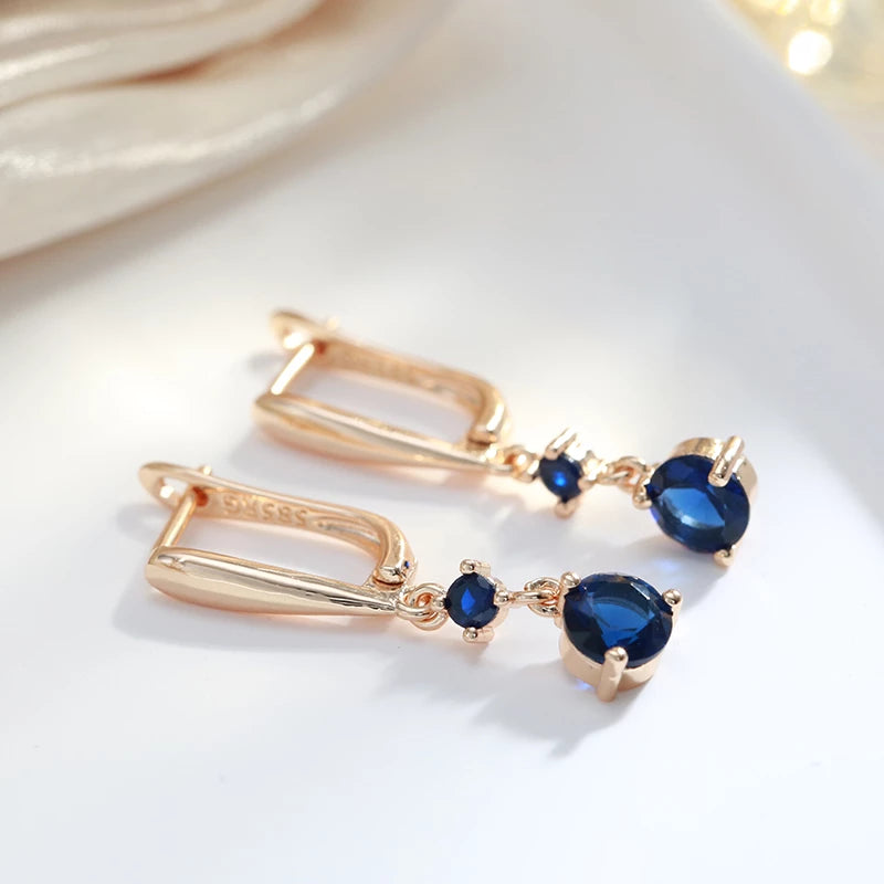 boucles d'oreilles pendantes avec zircon bleu