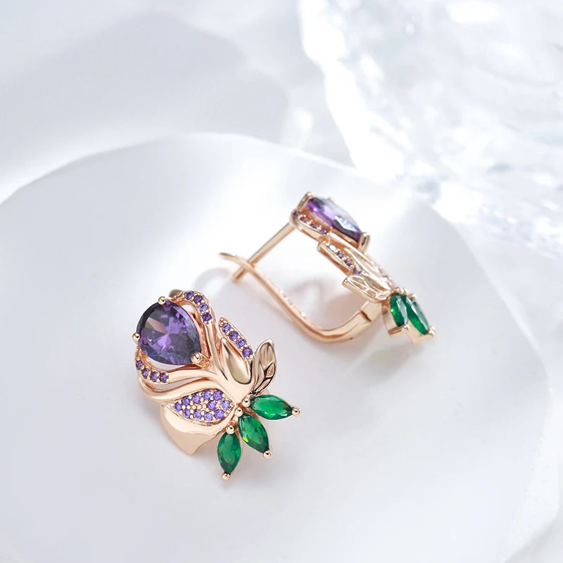 boucles d'oreilles avec zircons verts et mauves