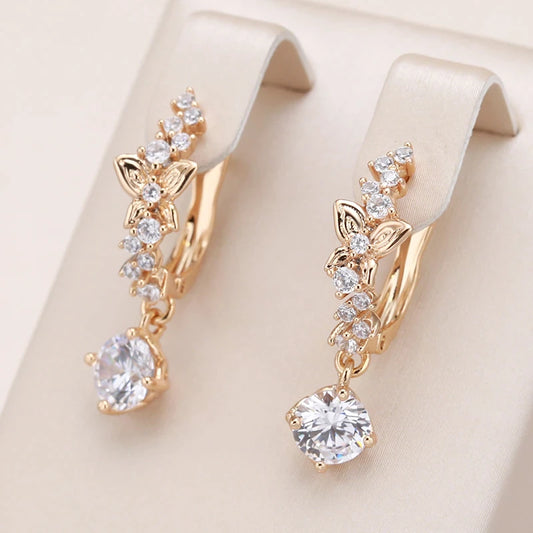 boucles d'oreilles papillons et zircons blancs