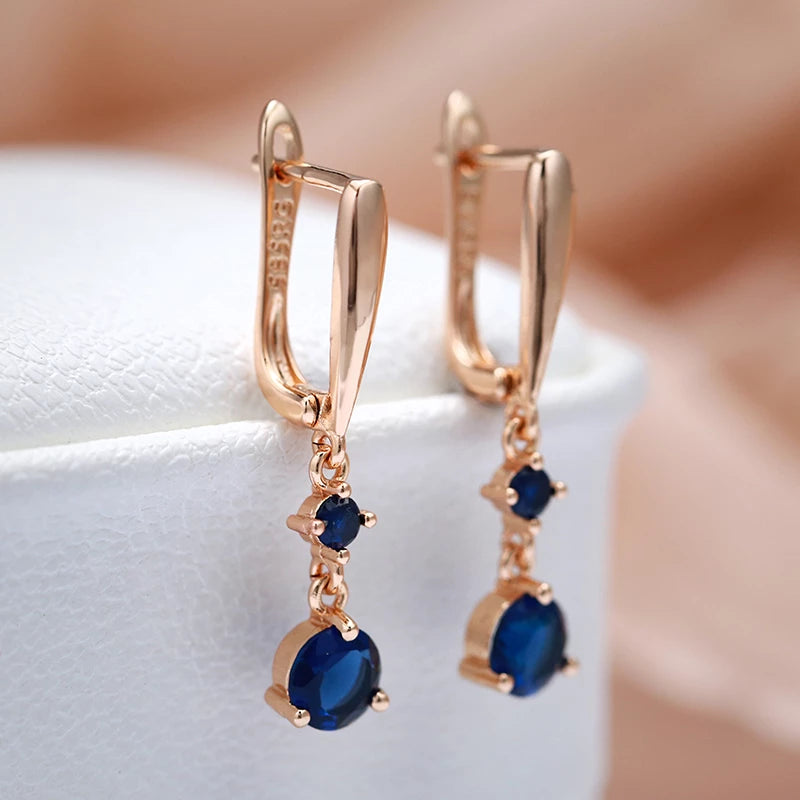 boucles d'oreilles pendantes avec zircon bleu