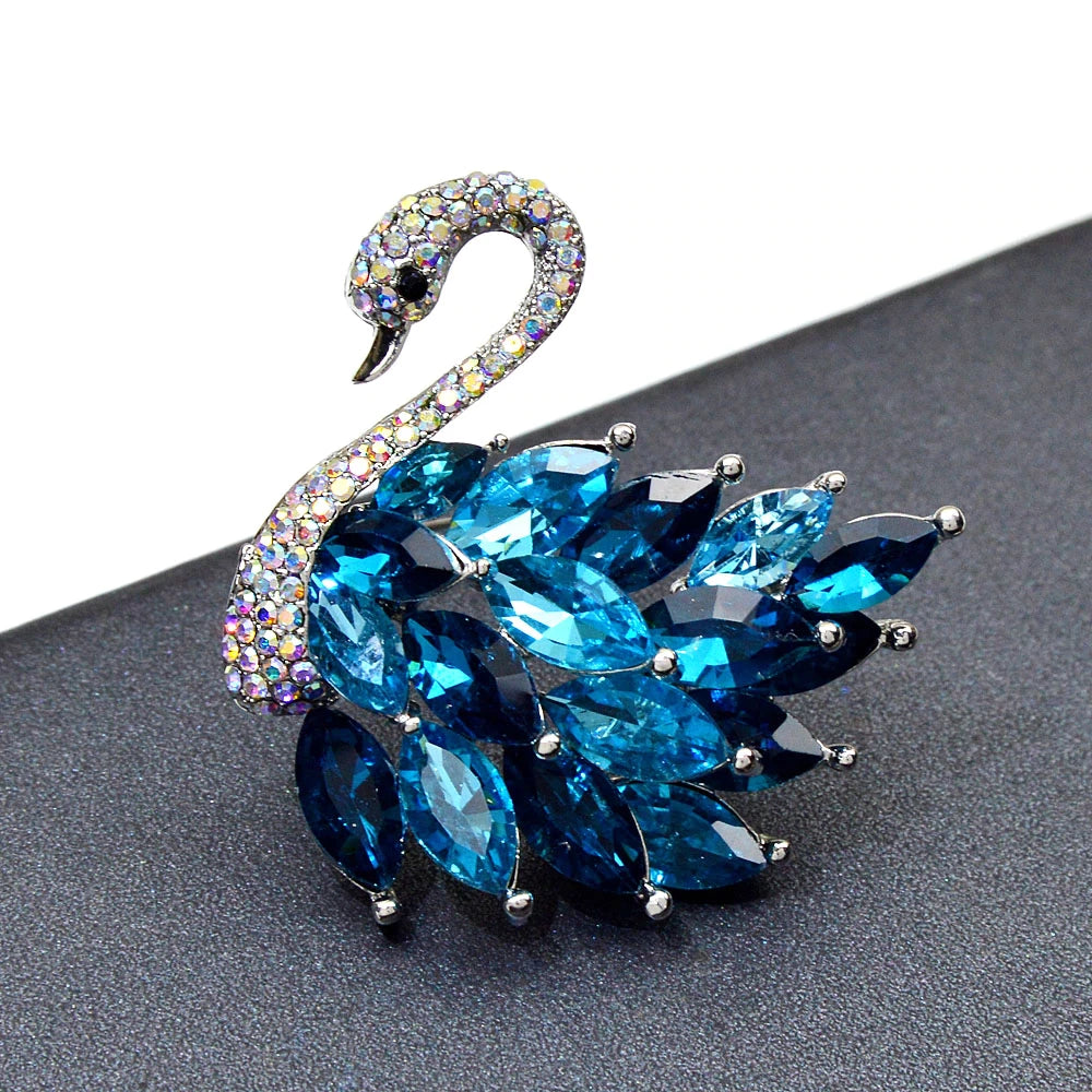 broche cygne avec zircons blancs et bleus